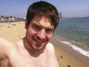 Very sexy white guy on a beach in Barcelona